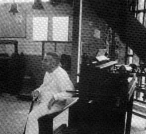Bhaktipada seated at a carillon