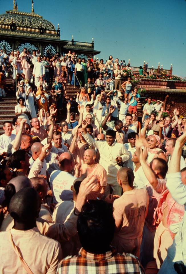 Bhaktipada (in center) and devotees having kirtan at Prabhupada's Palace of Gold, New Vrindaban, West Virginia, Labor Day Weekend (September), ca. 1982.